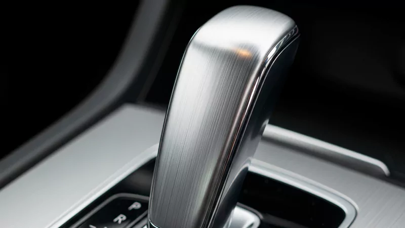 The brushed finish of the car gearshift lever