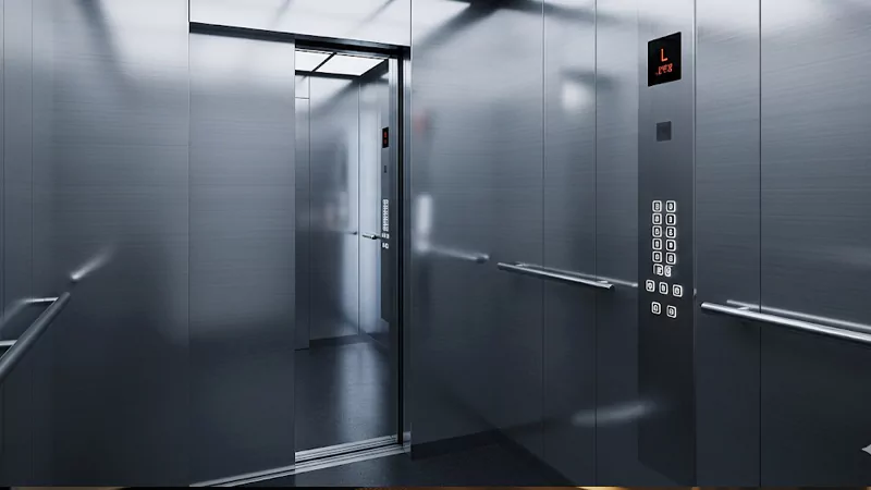 The brushed stainless steel finish of the elevator